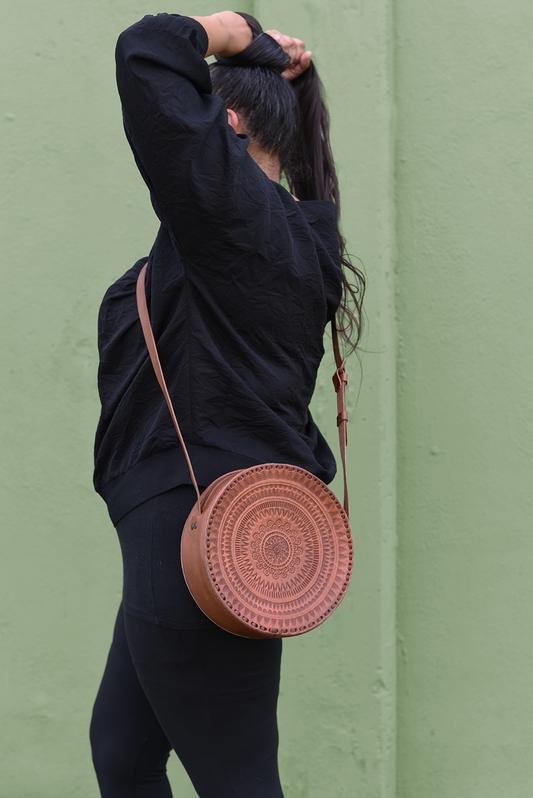 Embossed Leather Circle Crossbody Purse